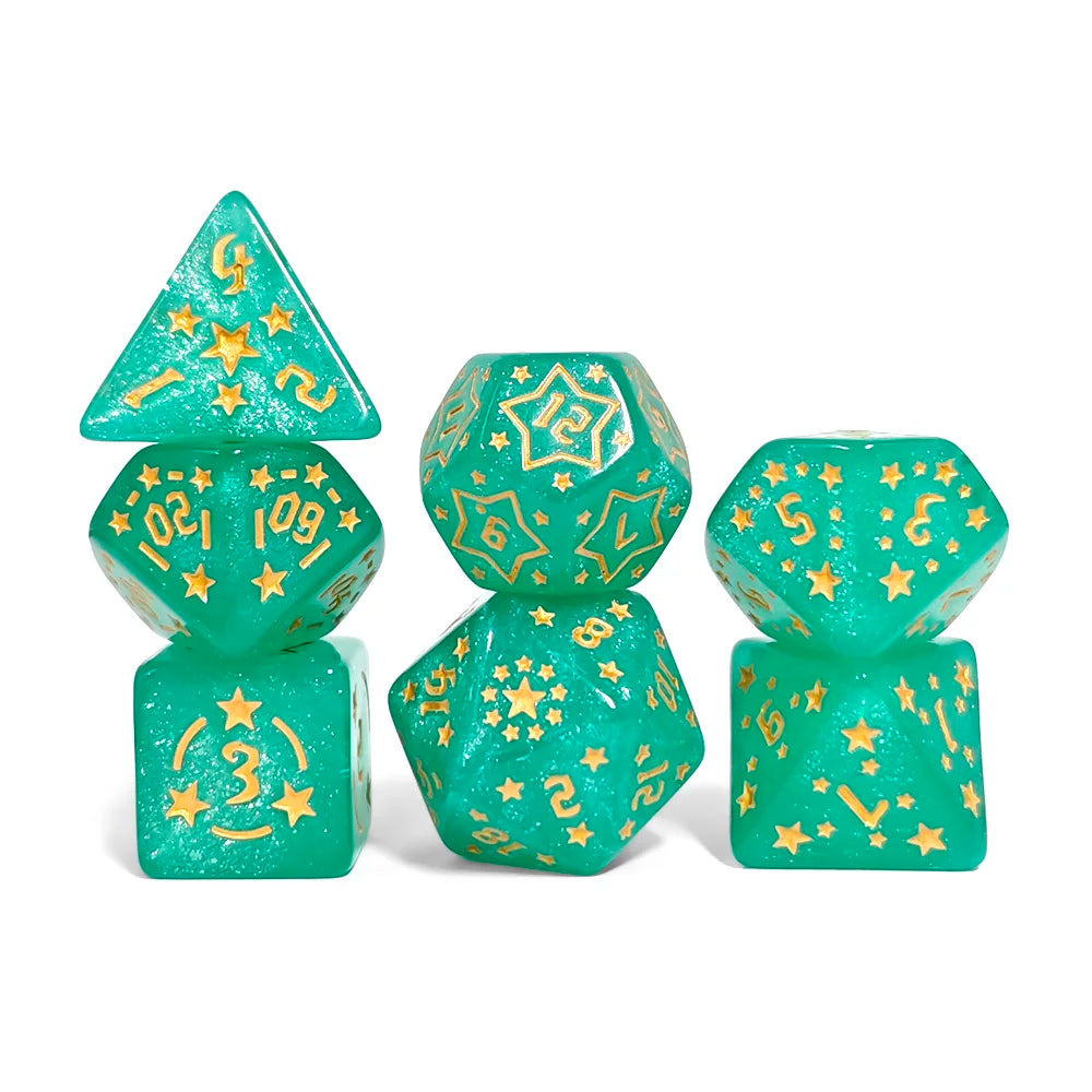 Set of green polyhedral dice with gold numbers and star patterns on a white background
