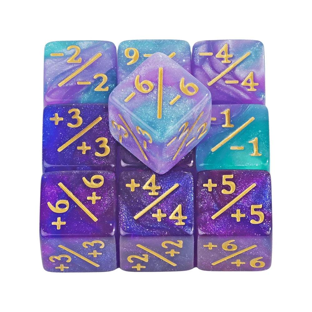 Set of purple and blue dice with gold numbers on a white background