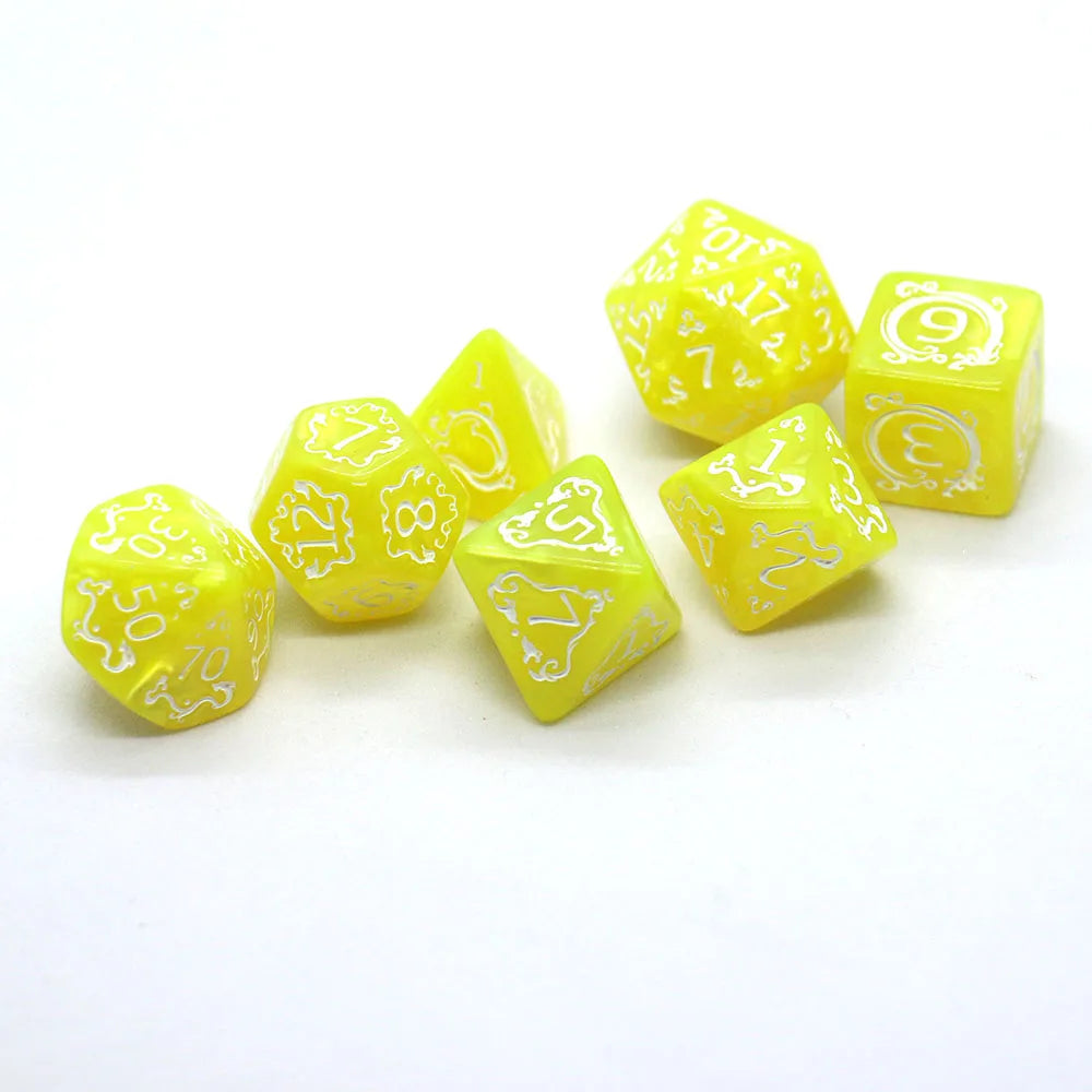 Yellow dice set with white numbers and symbols on a white background