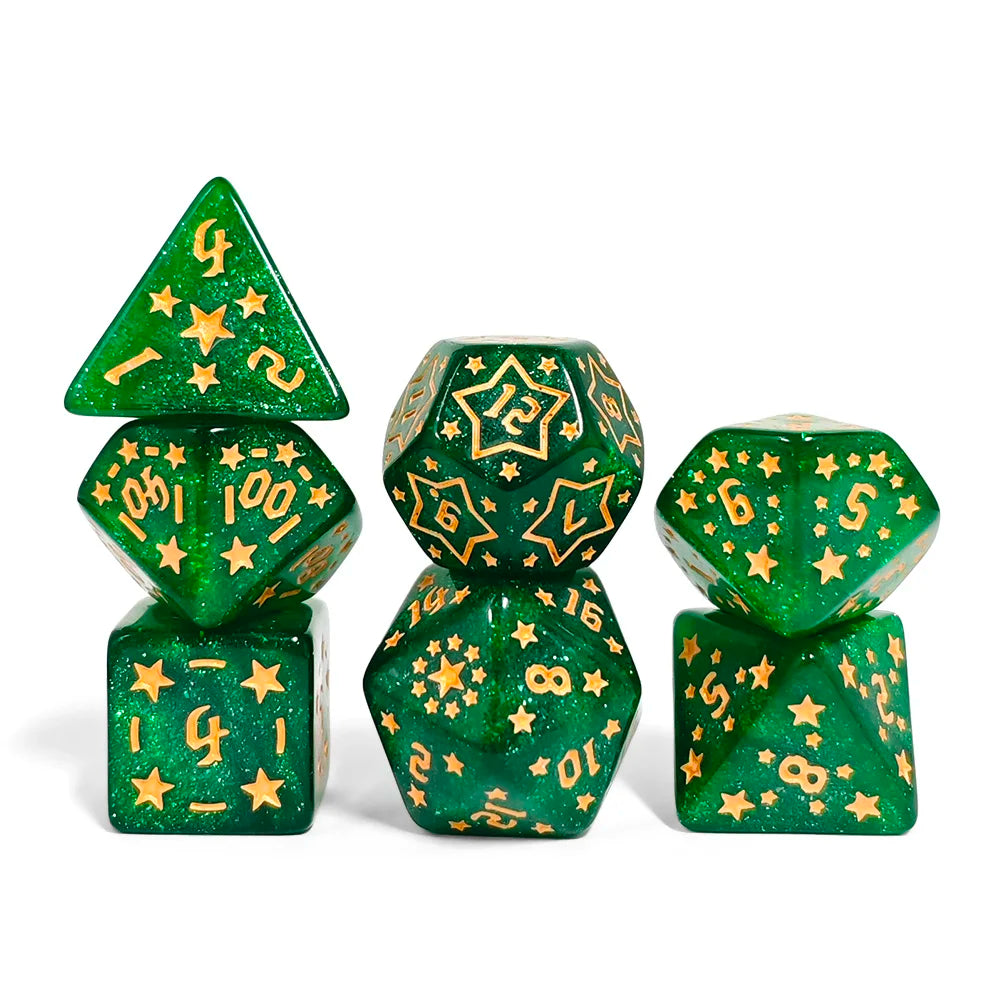 Set of green dice with gold numbers and star patterns on a white background