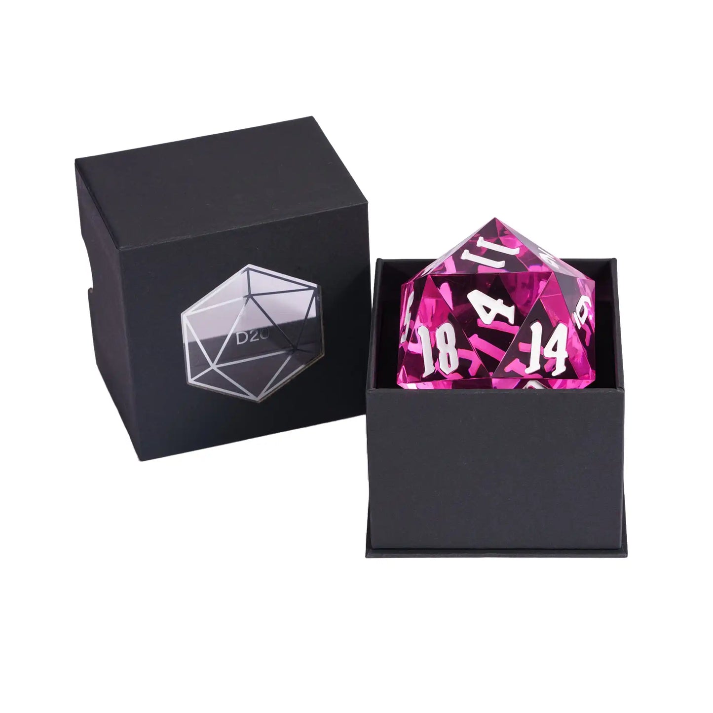 A pink translucent 20-sided die with white numbering, displayed next to its black presentation box featuring a silver geometric logo.
