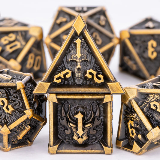 Decorative dice with intricate designs and gold accents on a white background