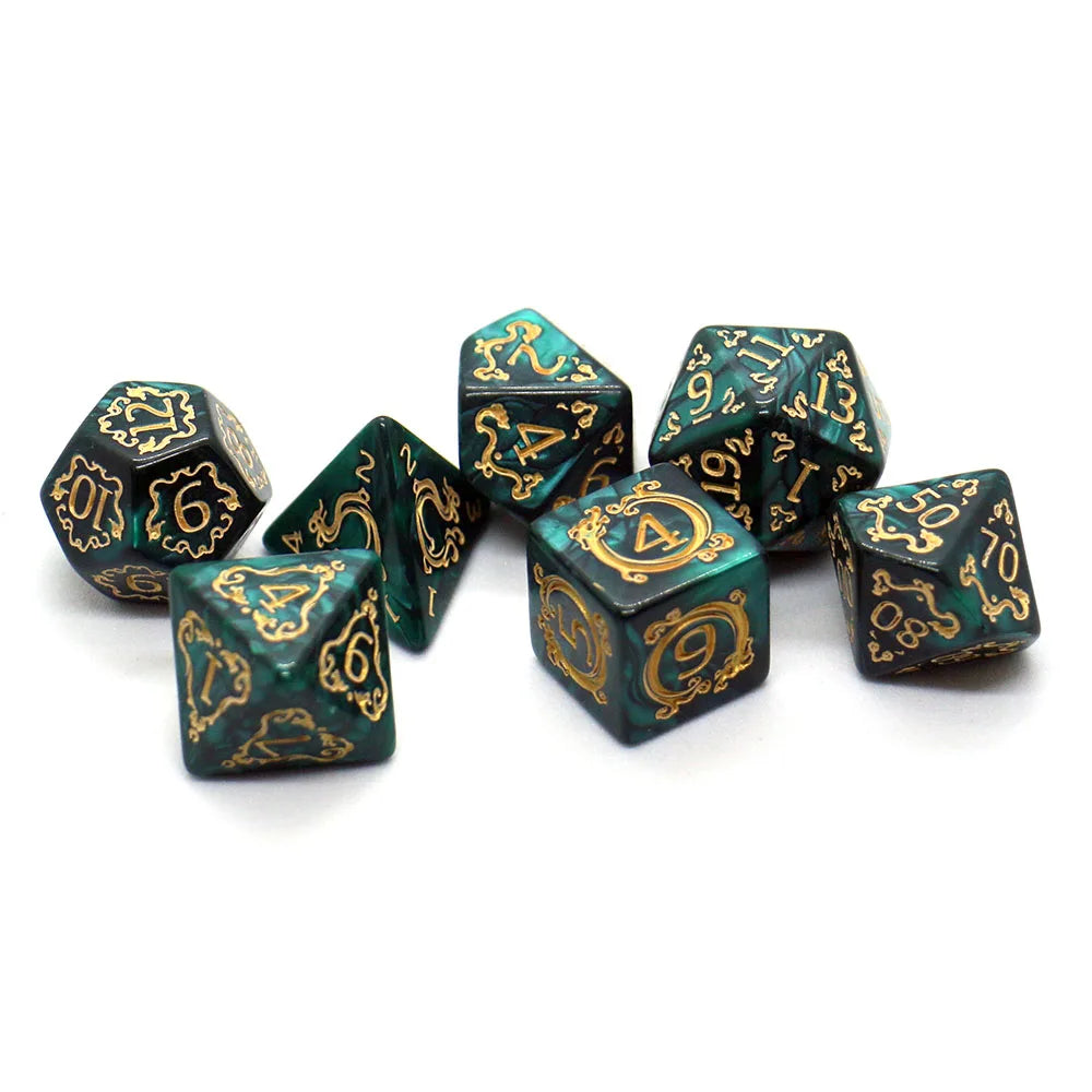 Set of dark green and black swirling polyhedral dice with gold numbering on a white background
