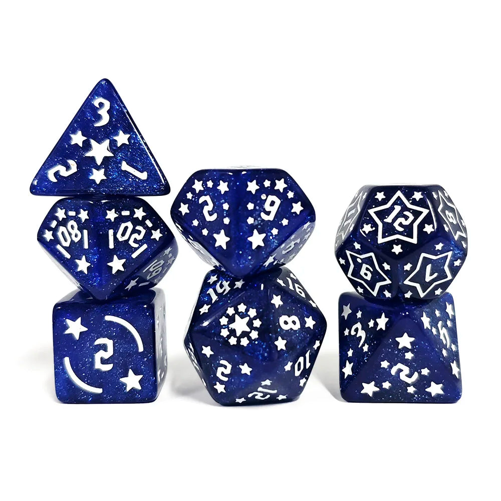 Set of blue polyhedral dice with white star patterns on a white background