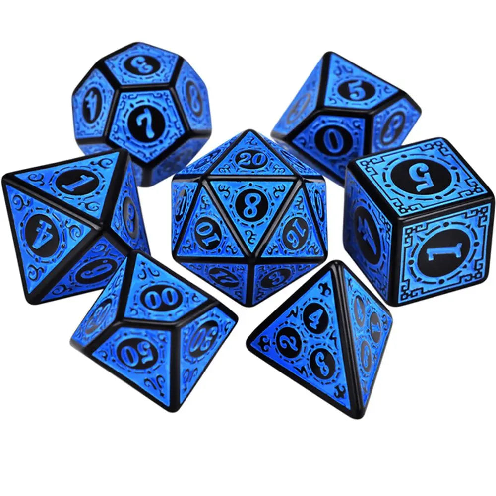 Set of blue and black polyhedral dice on a white background