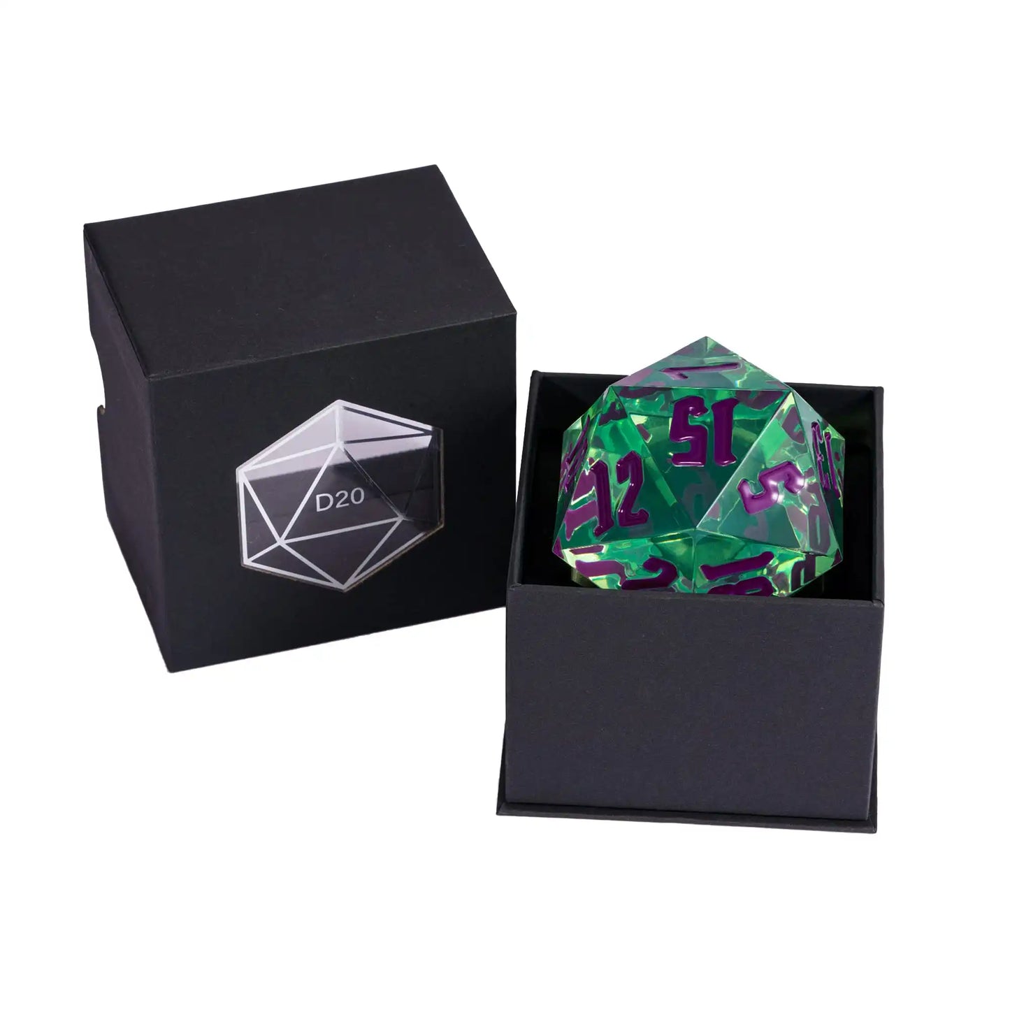 A green translucent 20-sided die with purple numbering displayed inside an open black presentation box, with the matching black box shown beside it on a white background.