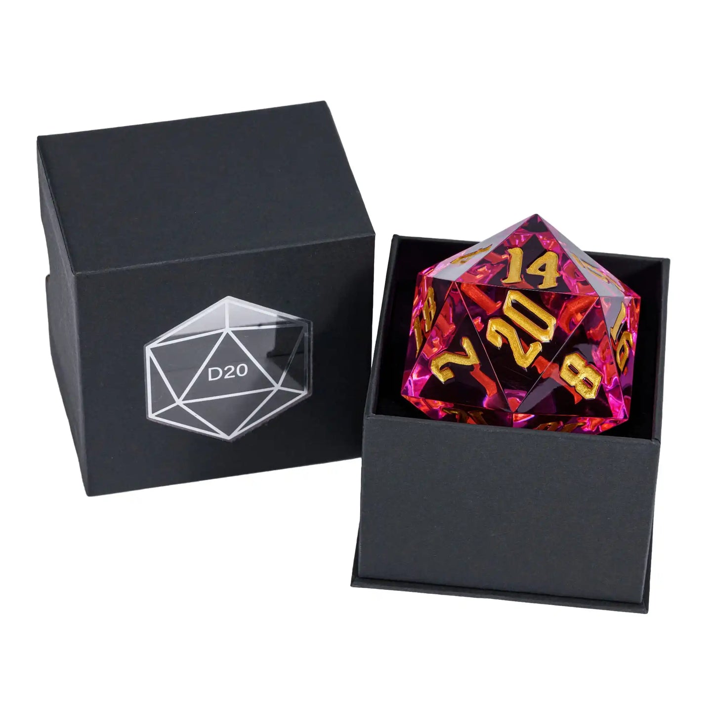 A translucent pink and purple 20-sided die with gold numbers displayed next to its black presentation box, with the closed box showing an engraved D20 symbol.