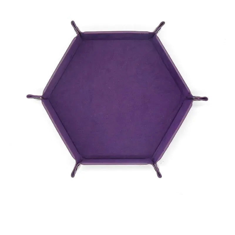 Hexagonal purple velvet dice plate on a white background