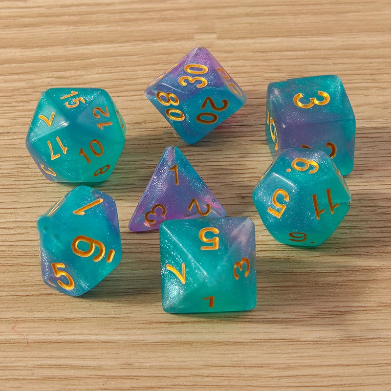 Set of colorful polyhedral dice on a wooden surface