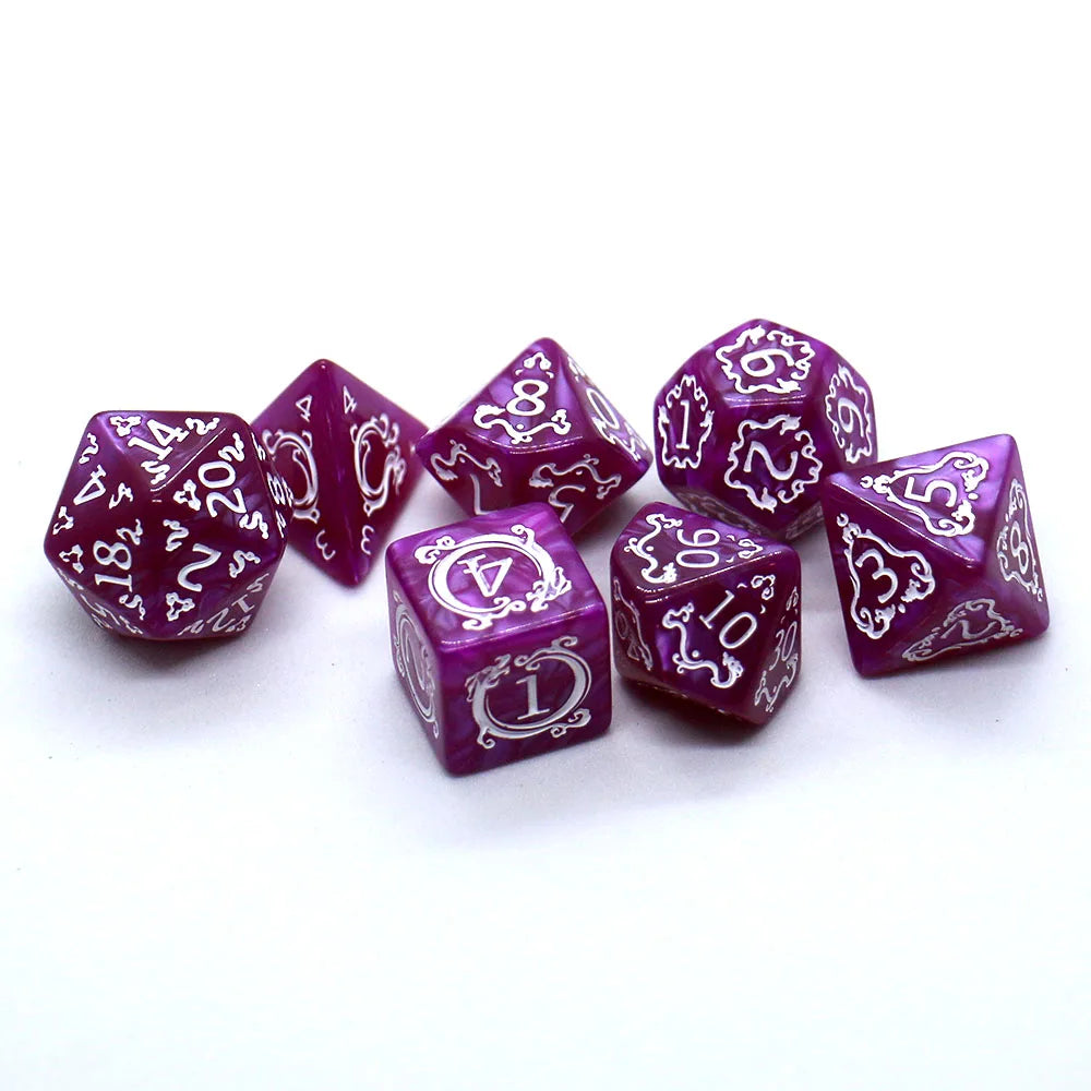 Purple polyhedral dice set with white numbering on a white background