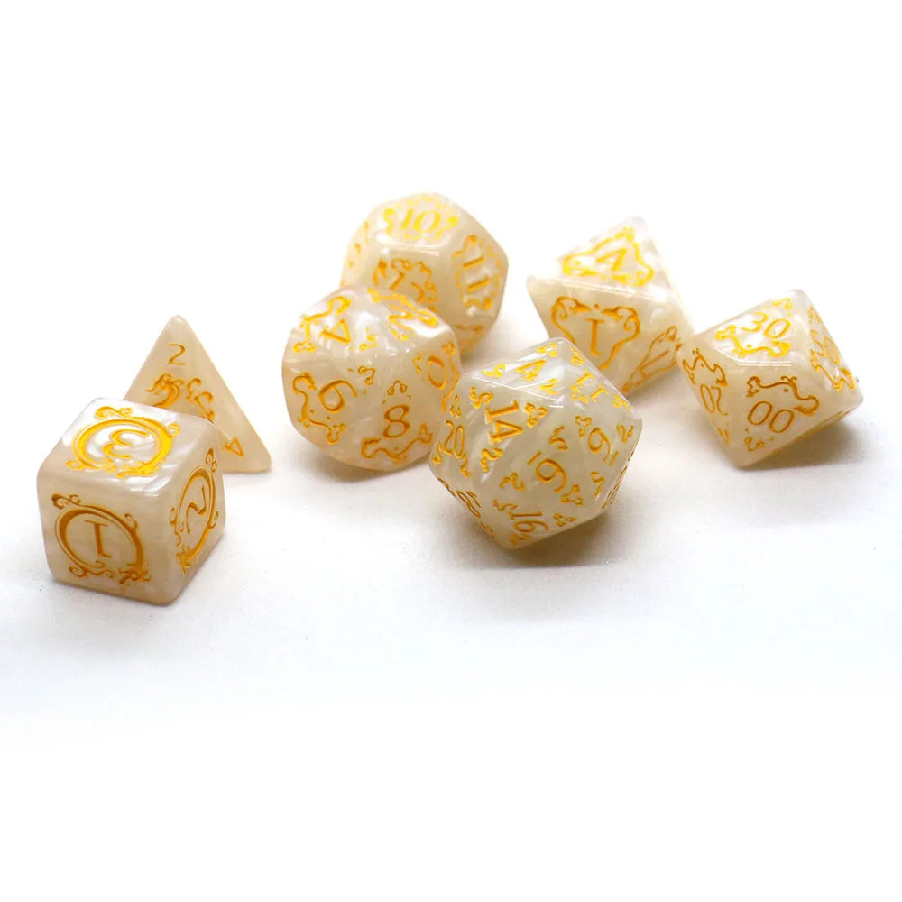 Set of white dice with gold numbering and symbols on a white background