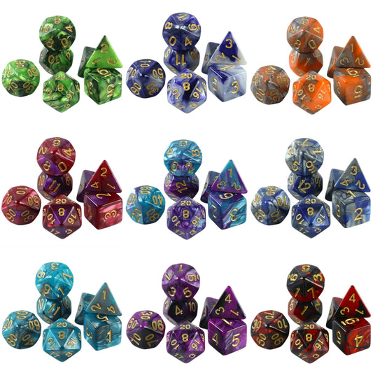 A set of 36 multi-colored polyhedral gaming dice, arranged in six rows of six on a plain white background. The sets include various colors like green, blue, orange, purple, red, and black, each with gold-colored numbering.