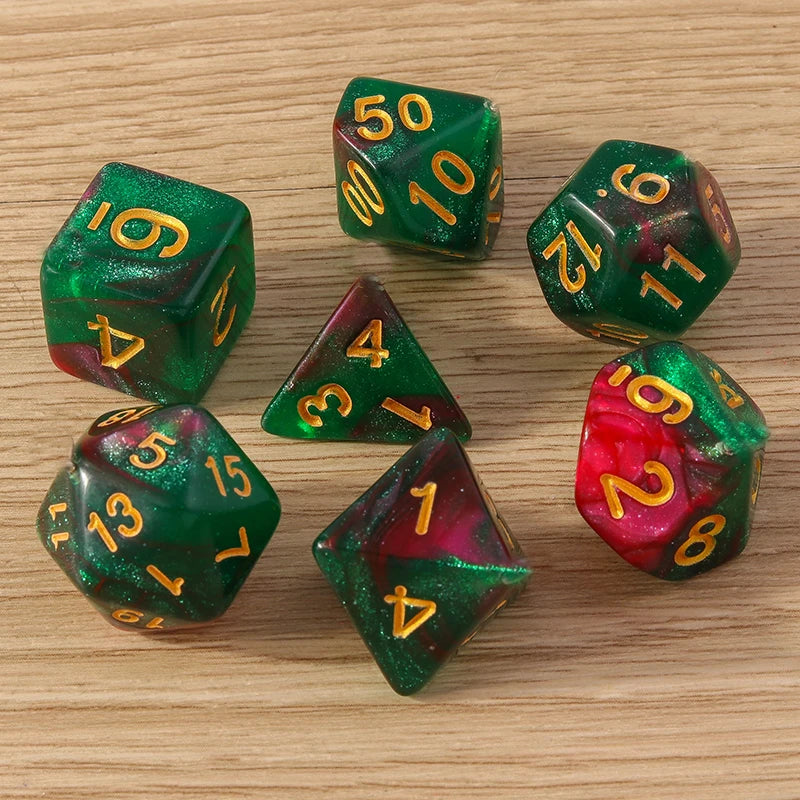 Set of colorful polyhedral dice with numbers on a wooden surface