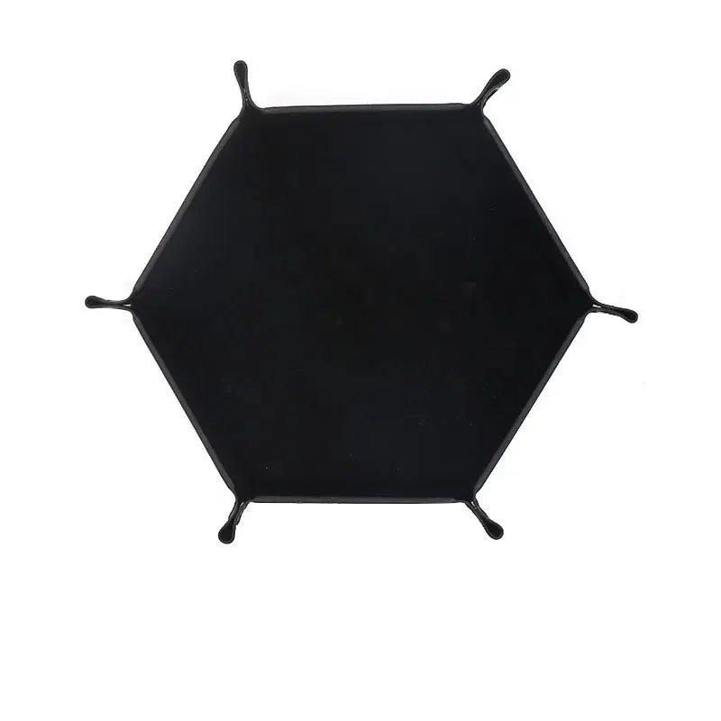 Hexagonal velvet dice plate in velvet black color on a white background