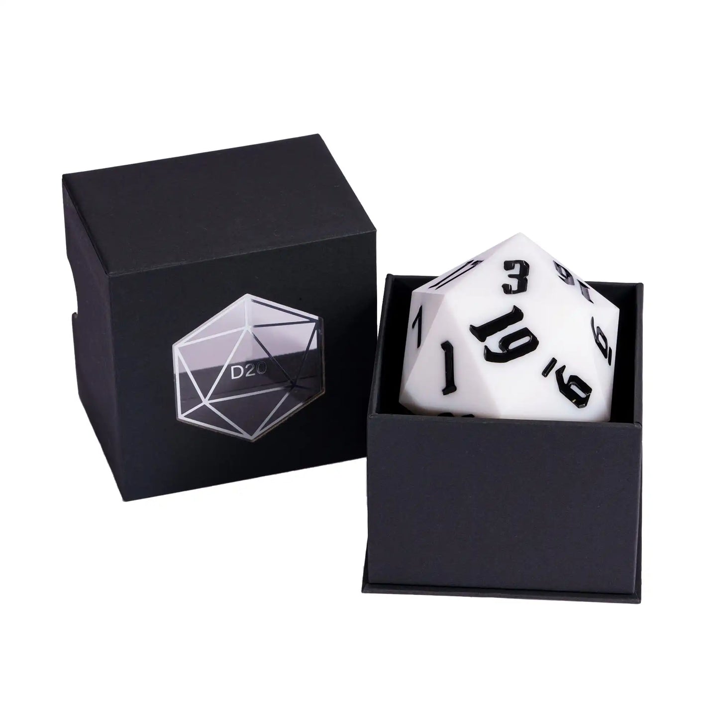 A white 20-sided die with black printed numbers displayed inside an open black box next to its closed black packaging box featuring a clear geometric D20 logo.