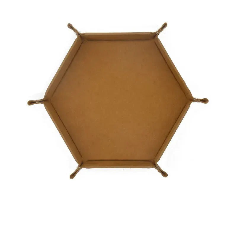 Hexagonal velvet dice plate in velvet brown color on a white background